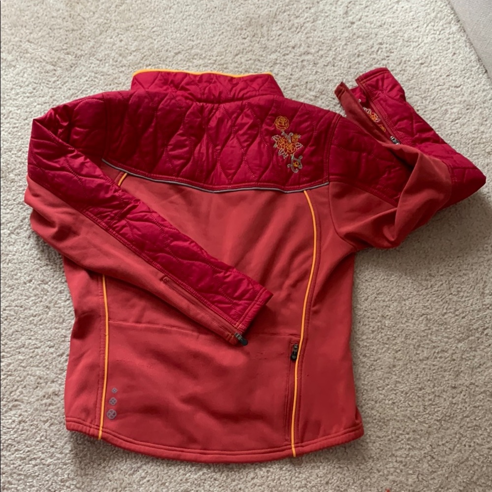Vibrant Quilted Jacket with Floral Embroidery